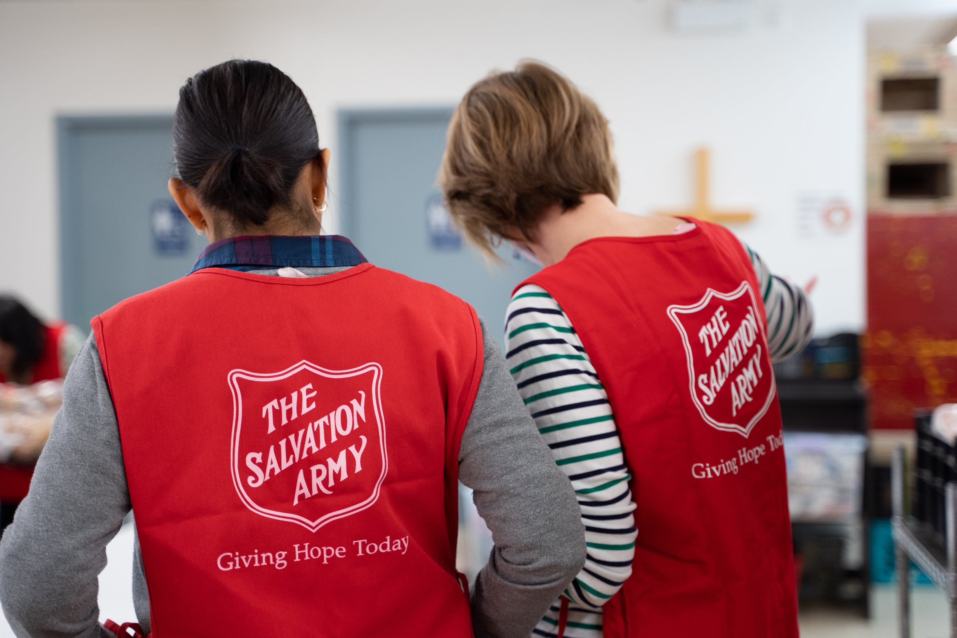 Volunteers helping a client