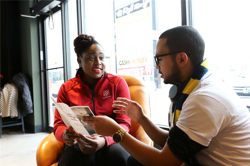 A client and volunteer meeting